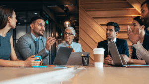 board members around a board meeting table